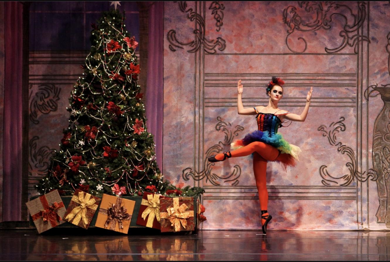A Valley Dance Theatre dancer en pointe in a Nutcracker party-scene costume